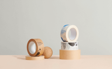 composition of four kraft tape rolls