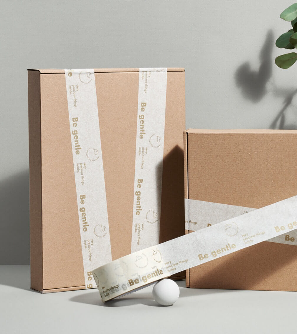 mailer boxes bound with printed kraft tape